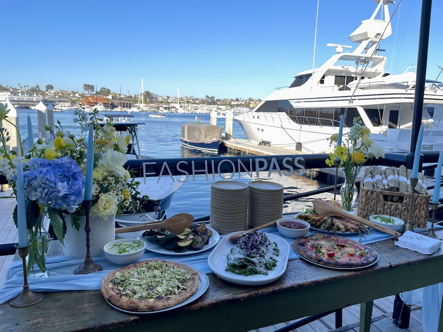 An outdoor buffet table above the water in Lido Marina Village.
